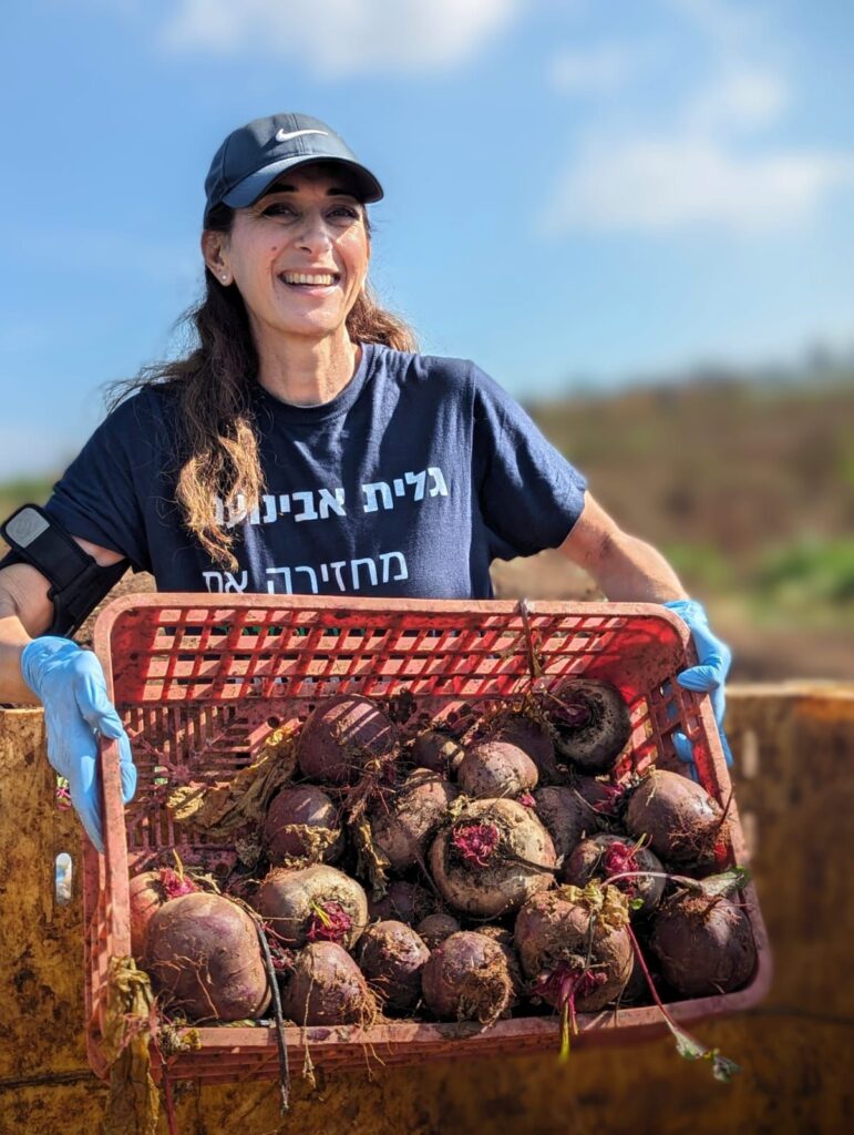 Woman carrying basket of beets
